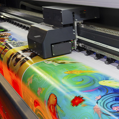 large format printing machine in operation. industry